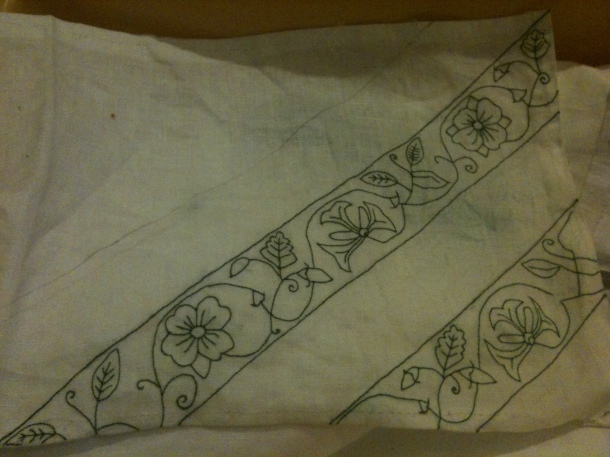 The still-to-be-completed chemise with stem-stich embroidery in green silk.