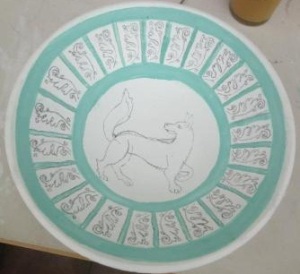 My bowl with design drawn on and the green pigment added.