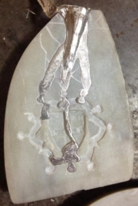 Examples of the various failed pours of pewter experienced in this project.