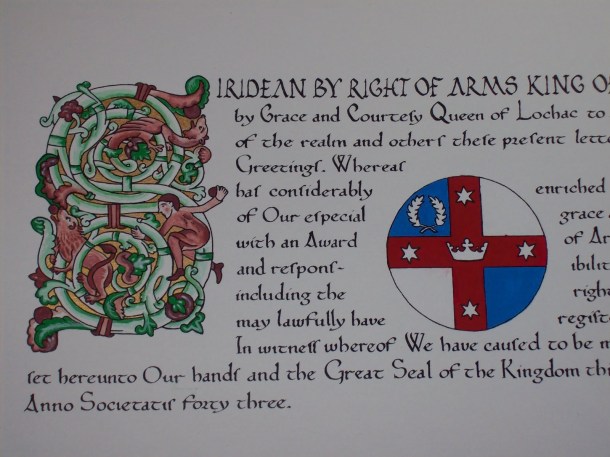 An AoA template scroll that I illuminated with gouache under the instruction of Mistress Leonie de Grey.