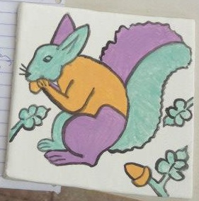 Squirrel tile with pigments, pre-firing.