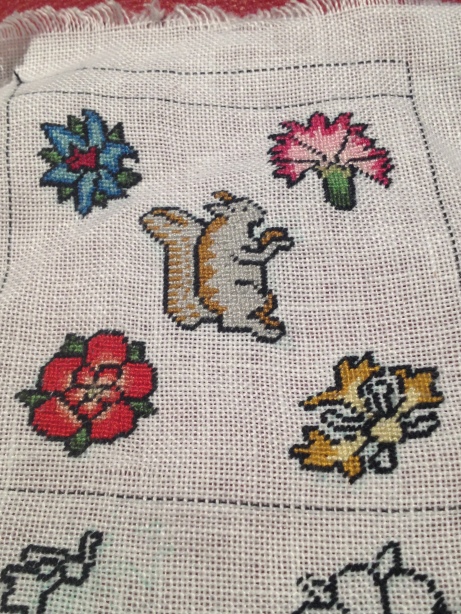 All flowers and squirrel are complete except for the stamens on the honeysuckle (bottom right).