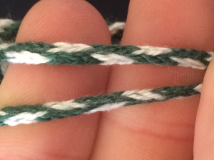 5 loop fingerloop braid made for the purse strings using 15th century instructions documented by Benns & Barrett (2005 - instruction number 1)