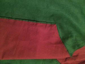 Figure 10: Photo of the lining, which was hand-sewn in to the jacket using stab-stitch. Photo by Ceara Shionnach, 2014.