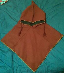 The hood for Haos, embroidered in green and white wool, made by Ceara Shionnach 2015.